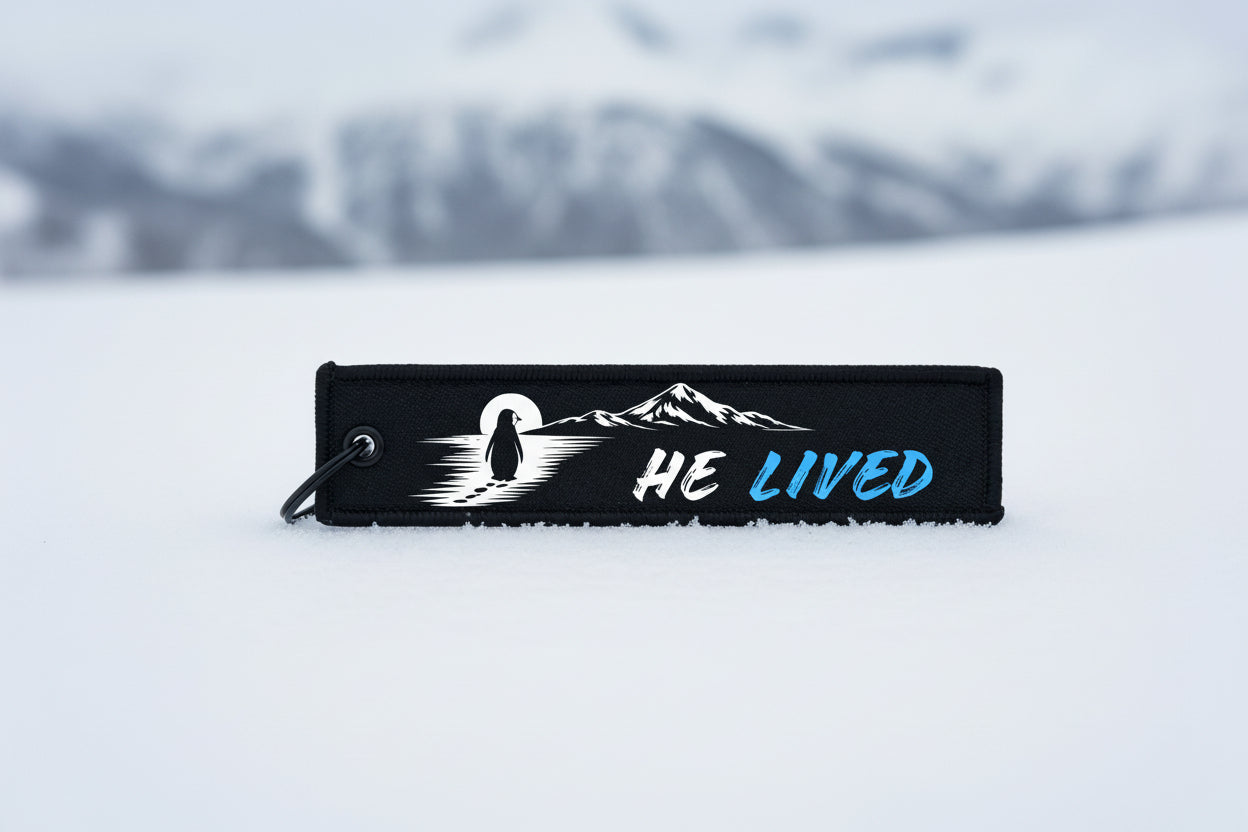 Nihilist Penguin Jet Tag Keychain – They Survived, He Lived